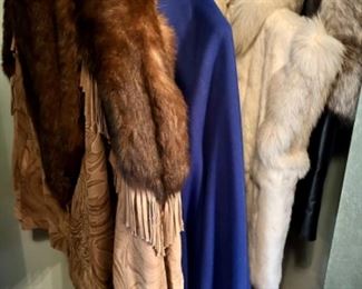 2 fur vests, 1 cape with fur tassels, 1 jacket with fur trim