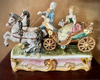 Large Capodimonte sculpture with figures on coach