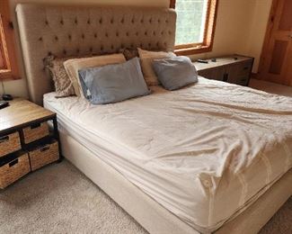 King platform bed and mattress neutral linen upholstery.  