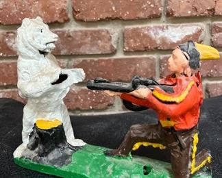 Vintage cast iron polar bear and Indian bank