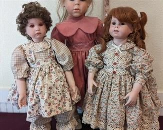 Calico And Pink Porcelain Dolls