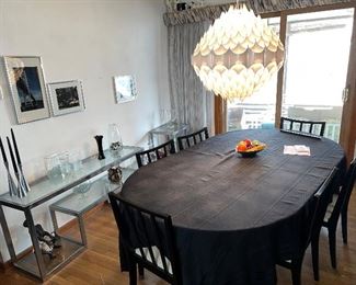 Long Chrome (expandable) Glass topped Chrome table $900