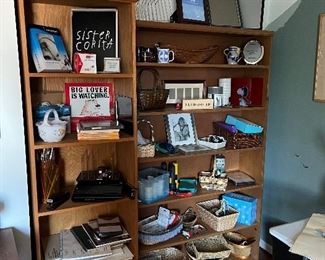 Collection of baskets, art supplies and frames