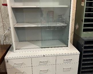 Chrome legged 6 Drawer File Cabinet with 2 Glass Door display case