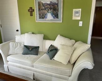 One of 2 white sofas