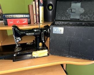 Singer “Featherweight” sewing machine with case. 