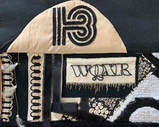 Detail: Wall hanging depicting elements from husband Lloyd Moss's career