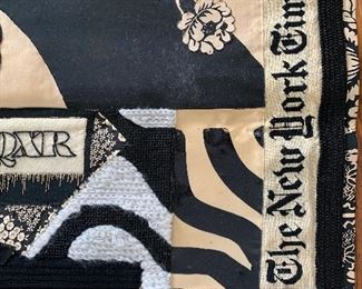 Detail: Wall hanging depicting elements from husband Lloyd Moss's career