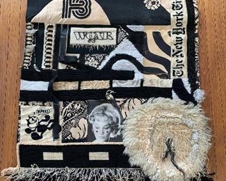 Wall-hanging art, shown in its entirety, depicting husband Lloyd Moss's career, pencil in foreground shown for scale