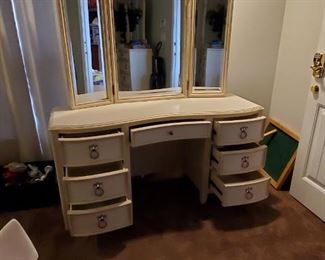 Beautiful cream colored dressing table. Approx. 6' wide