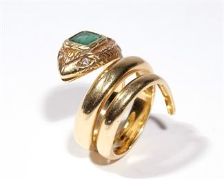 EMERALD, DIAMOND, & GOLD SERPENT RING  |  Designed as an 18k yellow gold coiled serpent, the rose and yellow gold head mounting an approximately 0.65ct emerald-cut emerald (6.3 x 5 x 3 mm) and a .20ct round brilliant cut diamond, they eyes mounting melee diamonds; size 6, 20.7g; marked "750" and "[star]220ROMA"