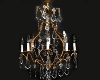 BACCARAT FRENCH BRONZE & CRYSTAL CHANDELIER | having 8 lights and crystal drops suspended from a dore bronze cage, crystal signed "Baccarat / France" complete with original receipt, and other paperwork
h. 37 dia. 25-1/2 in.