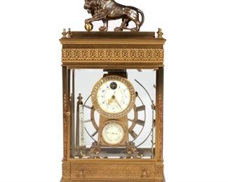 BRASS FERRIS WHEEL GRAVITY CLOCK | 20th century, a ball-bearing gravity clock surmounted by a bronze figure of a lion with its paw on a ball, no apparent signature
h. 21-1/2 w. 11-1/2 d. 6-1/2 in.
N.B. Descriptions are revised from a 1994 insurance appraisal by a noted N.Y.C. auction house Horologist