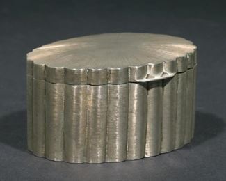 MARIO BUCCELLATI STERLING SILVER BOX | Designed as an oval box with engraved pattern and gadrooned sides marked "925 / M. BUCCELLATI / ITALY" and with other hallmarks; 9.5 ozt
h. 2-1/2 w. 4-3/4 in.