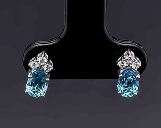 Oval Cut Blue Topaz & Diamond Cluster Stud Earrings in 14k Yellow Gold