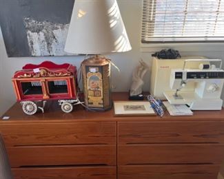 Wooden circus wagon, the other lamp; Singer sewing machine