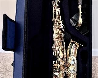 Saxophone with case