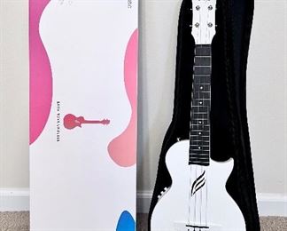 Enya electric ukulele with case and box