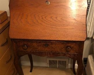 Antique oak dropfront writing desk (25.5”W, 42”H, 14.5” deep when closed, 27” deep when open)