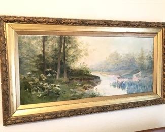1907 landscape painting on board in period gilt frame, signed lower left “MEJ” with date. Image 12.5” x 29.5”, framed size 19” x 36". (Presumed to be English as art board has the stamp of Winsor & Newton - London on back)
