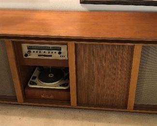 With doors open: Crosby console stereo with AM/FM & record player & speaker at each end