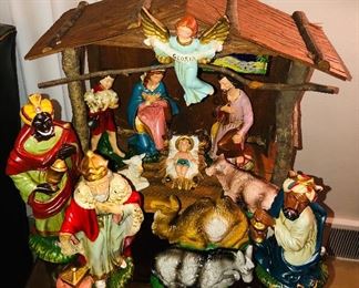 Large vintage Nativity set - wooden crèche with 12 hand painted papier-mâché composition figurines. (Made in Japan) Crèche is 22”L, 16”H, 12”D, tallest wiseman is 13”. 