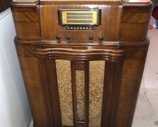 Art Deco Silvertone radio & record player - Model 7067. It works! (28”L, 38”H, 17”D)