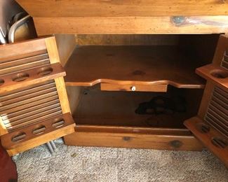 Interior of bar (has something sticky spilled on lower shelf)