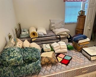 Twin beds & brass headboards, bedding, etc.