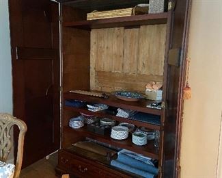 Doors open showing the entire interior, items inside are not in the sale