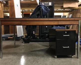$1200. Vintage 1950's rosewood desk with leather top, chrome and steel legs. 60"w x 30"d x 30"h. filing cabinet included and matches. This is offsite in Kent.