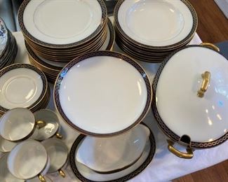 $300. Limoges set includes 8 salad, 9 dinner, 7cups and saucers plus an extra saucer, 1 gravy boat, 1 pedestal compote, 8 soup bowls 1 lidded tureen.