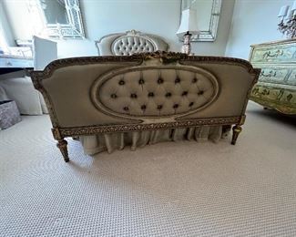 close up of the beautiful tufted footboard