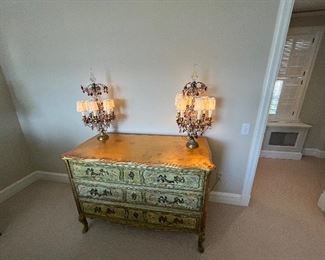 $380. Pair of wired Girondelle style antique lamps.  27.5"h.  Chest has sold