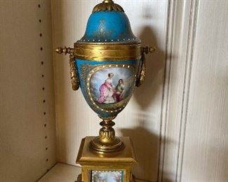 $680. obo. One of a pair of painted and gilded lidded urns on stands. 14.25"h base is 5.25"w x 3.5"d.
