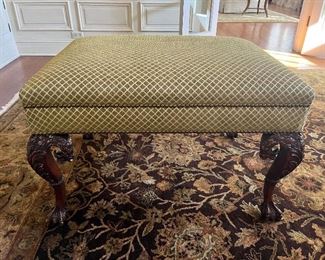 $240  Antique upholstered ottoman with carved wooded frame.  31"w x 23"d x 20"h