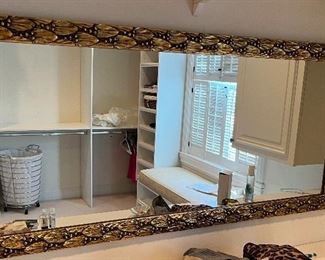 $290. Gilded mirror with leaf pattern on the frame. 25.25"h x 51"w.