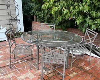 $680. obo Brown Jordan dining set - four chairs and a 61" diameter x 29.5" h table