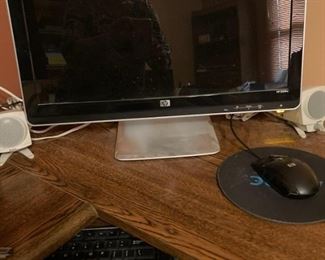 Several computers and monitors