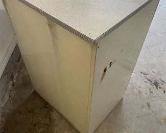White Metal Cabinet  with drawer.                                                        24"W 20"D 36"T                                                                                                  $45.00     