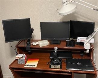 Desk, monitors, laptop, lamps, etc.