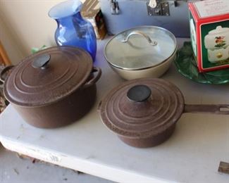 Le Creuset pots in the garage
