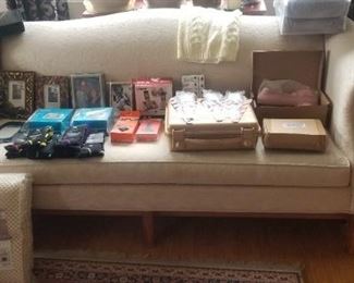 Chippendale sofa and matching loveseat in cream upholstery