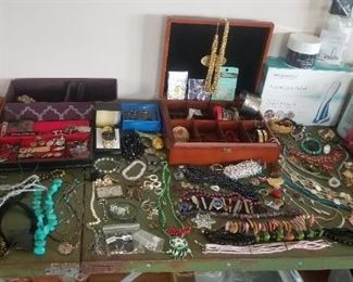Extensive amount of costume jewelry; watches and sunglasses: Ray-Ban