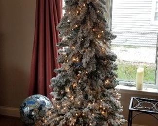 Beautiful flocked pre-lit Christmas tree