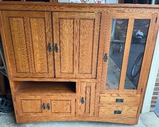 Garage:  This reproduction Arts & Crafts/Mission-style unit was brought up from the lower level to make it easier for you to load in to your vehicle upon purchase.   It measures 63-1/2" wide x 58" tall x 24" deep.