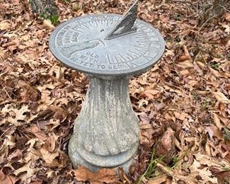 Outside:  A classic sundial on concrete base is always fun to have.