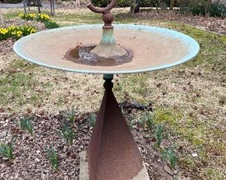 Outside:  A metal bird bath by sculptor Tom Torrens is really cool!