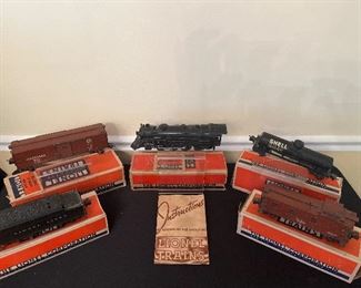Dining Room:  This pre-war semi-scale Lionel 226  (circa 1940) "O" Gauge train set has its original boxes and a "Lionel Trains Instructions" booklet.  Included are:  Coal Tender-2226WX; Pennsylvania Box Car-2954; Locomotive-226E;  SHELL Oil Tanker- 2955; and Caboose -2957 (NYC #19400).  