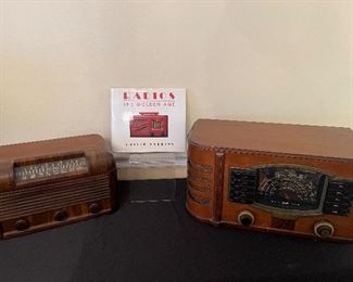 Dining Room:  A "Radios - The Golden Age" book is flanked by:  RCA Victor Tube Radio EMR01014A (circa 1940) AND a ZENITH Short Wave Radio (Model 75633R) with a wooden case that receives Standard Broadcast (117 volts & 60 cycles).  Hint:  a fun project would be to gut them and convert them to be Blue Tooth speakers!